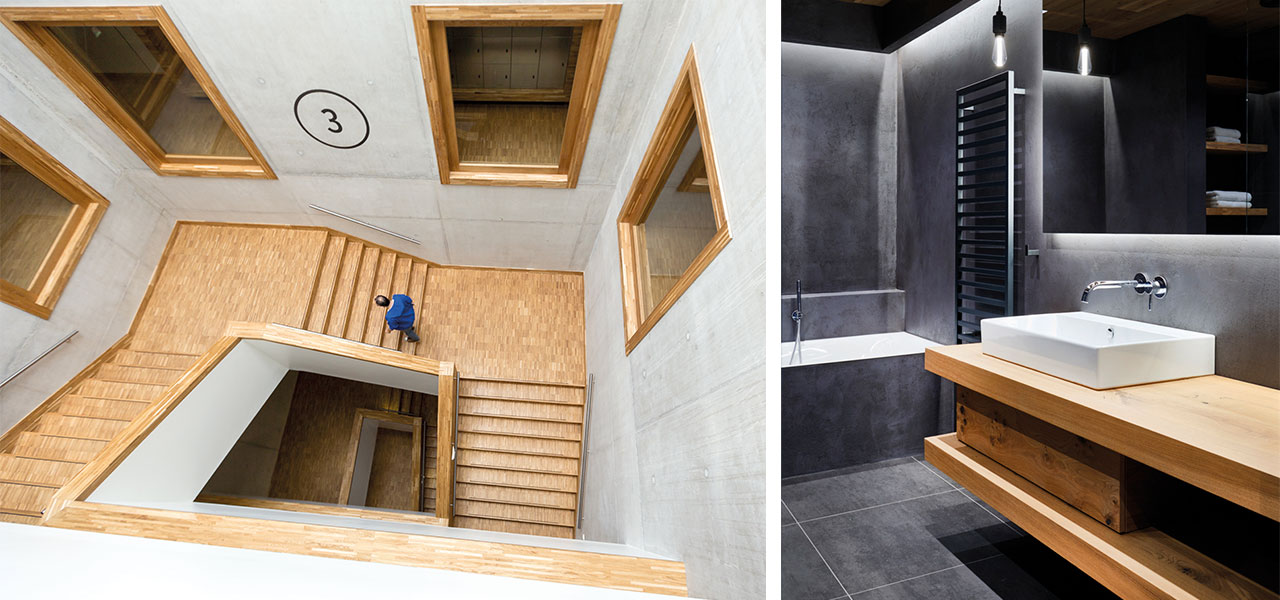 Links: een grote houten trap met een open ruimte in het midden, omgeven door betonnen muren en grote ramen. Rechts: een moderne badkamer met een houten wastafelblad en een grijze industriële afwerking.